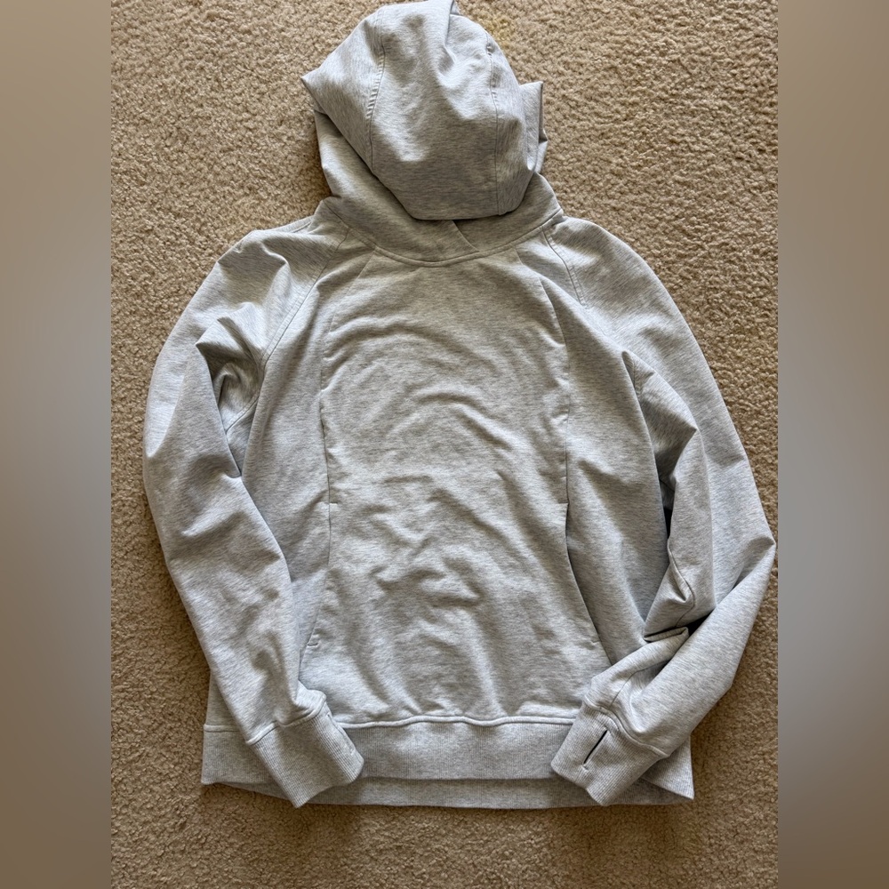 Like new lululemon light gray hoodie size 14 pockets
